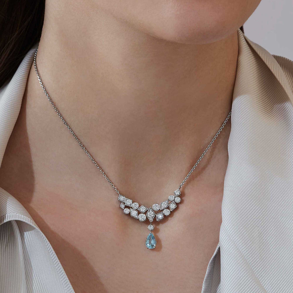 Garrard-Albemarle-Abstract-jewellery-Collection--transformable-diamond-necklace-in-18ct-white-gold,-2017419,-and-earrings,-on-Model