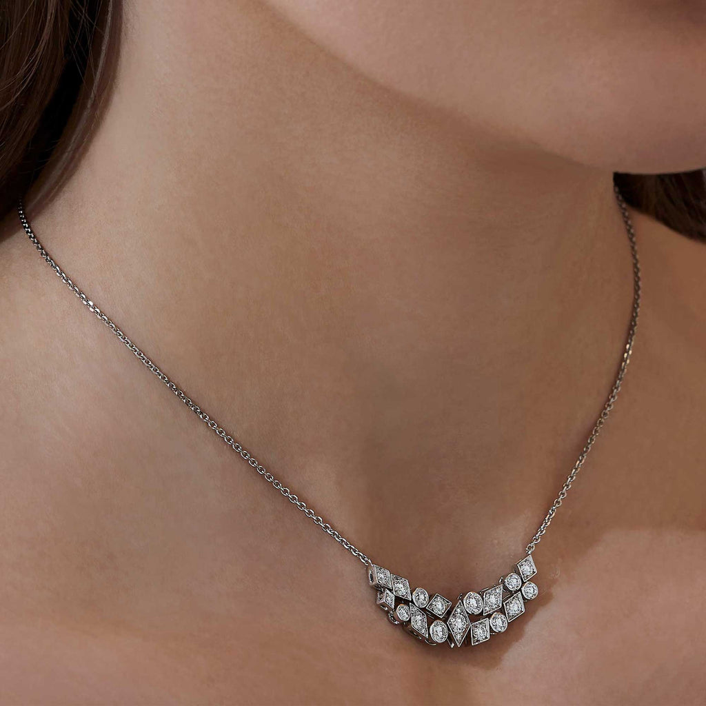 Garrard Albemarle Abstract jewellery Collection transformable diamond necklace in 18ct white gold, 2017419, and earrings, on Model