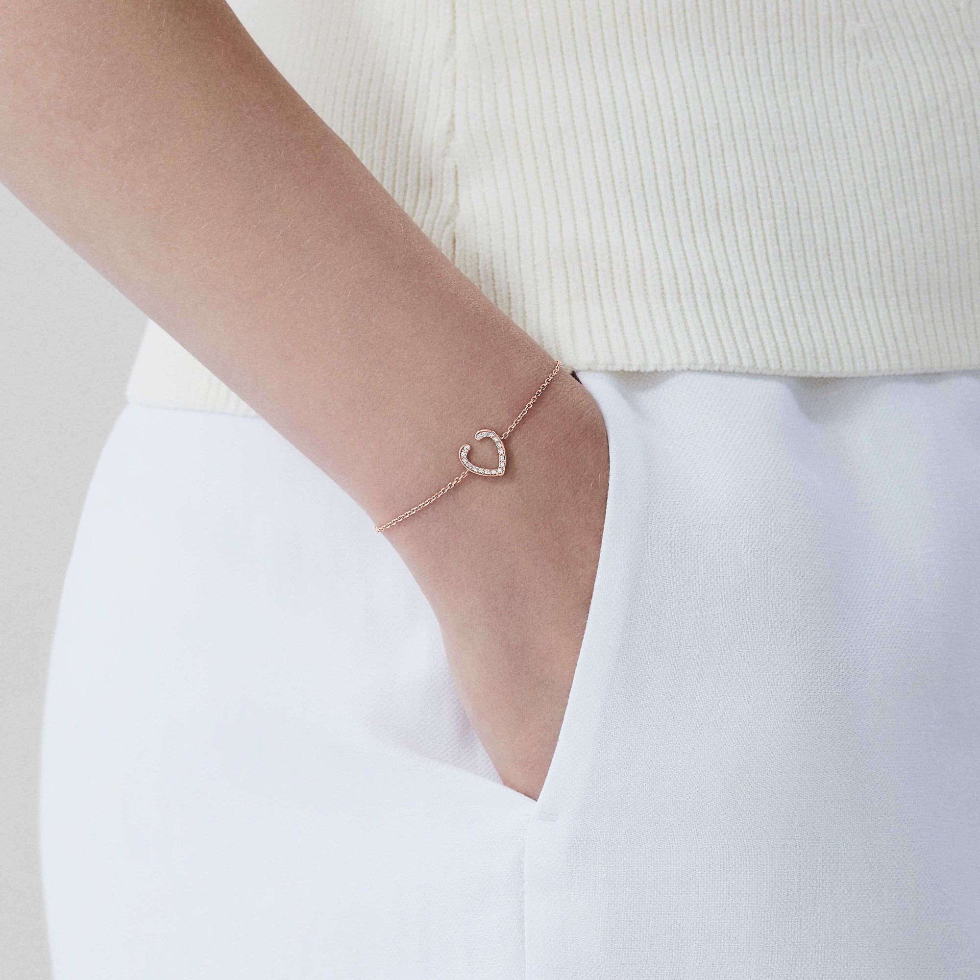 Garrard Aloria Mini Icon collection white diamond bracelet in 18ct Rose Gold 2018650 on model