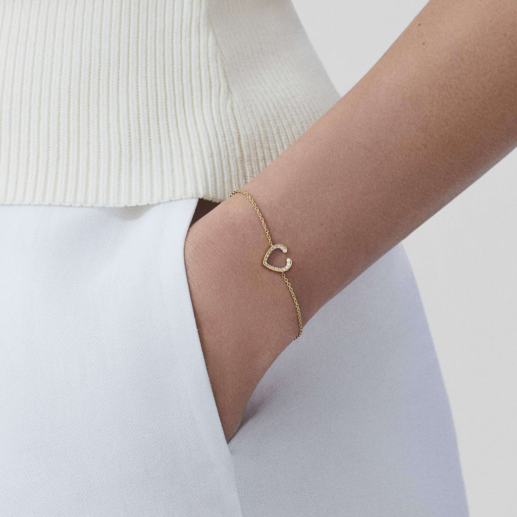 Garrard Aloria Mini Icon collection white diamond bracelet in 18ct yellow gold 2018651 on model