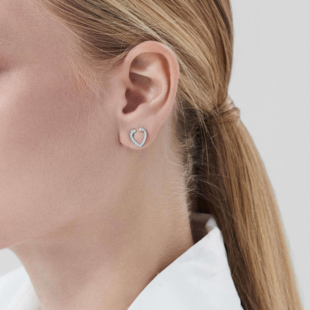 Garrard Aloria Mini Icon collection white diamond earrings in 18ct white gold 2018646 On Model