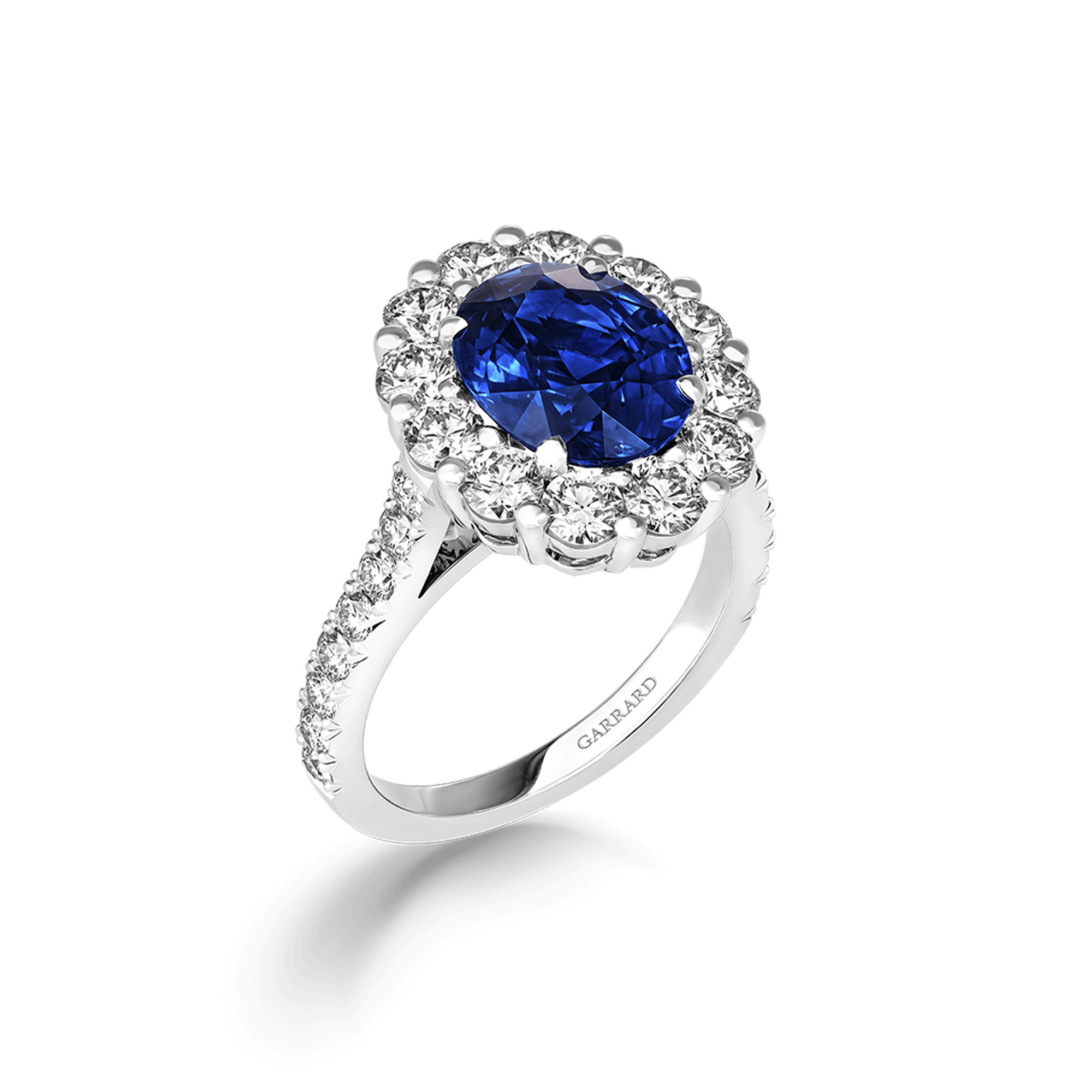Jewelled Vault 3.68cts Oval Royal Blue Sapphire and Diamond Cluster Ring | In Platinum