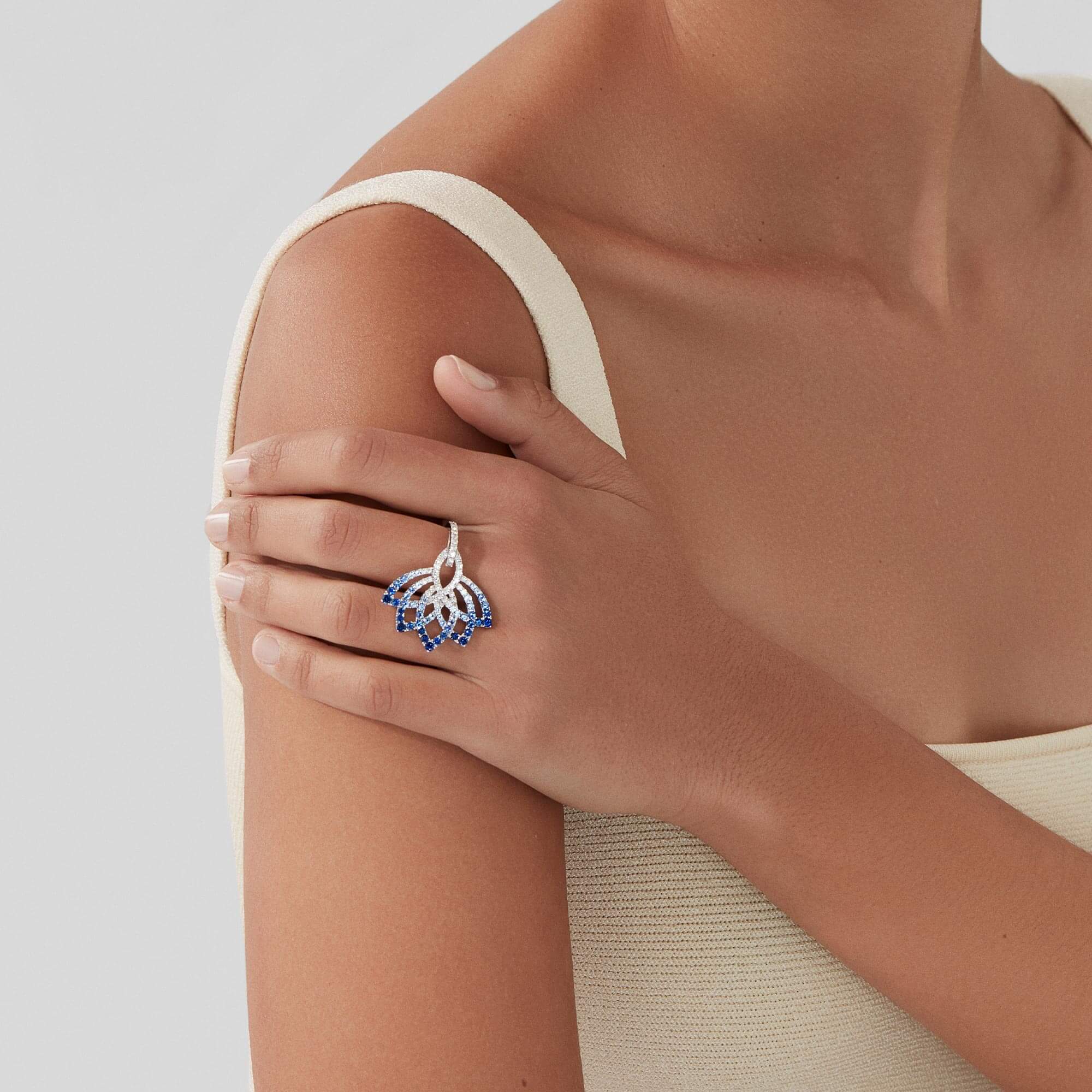 Garrard Lotus Jewellery Collection Lotus Flower Blue Sapphire and and Diamond Ring in 18K White Gold, 2019334, Model