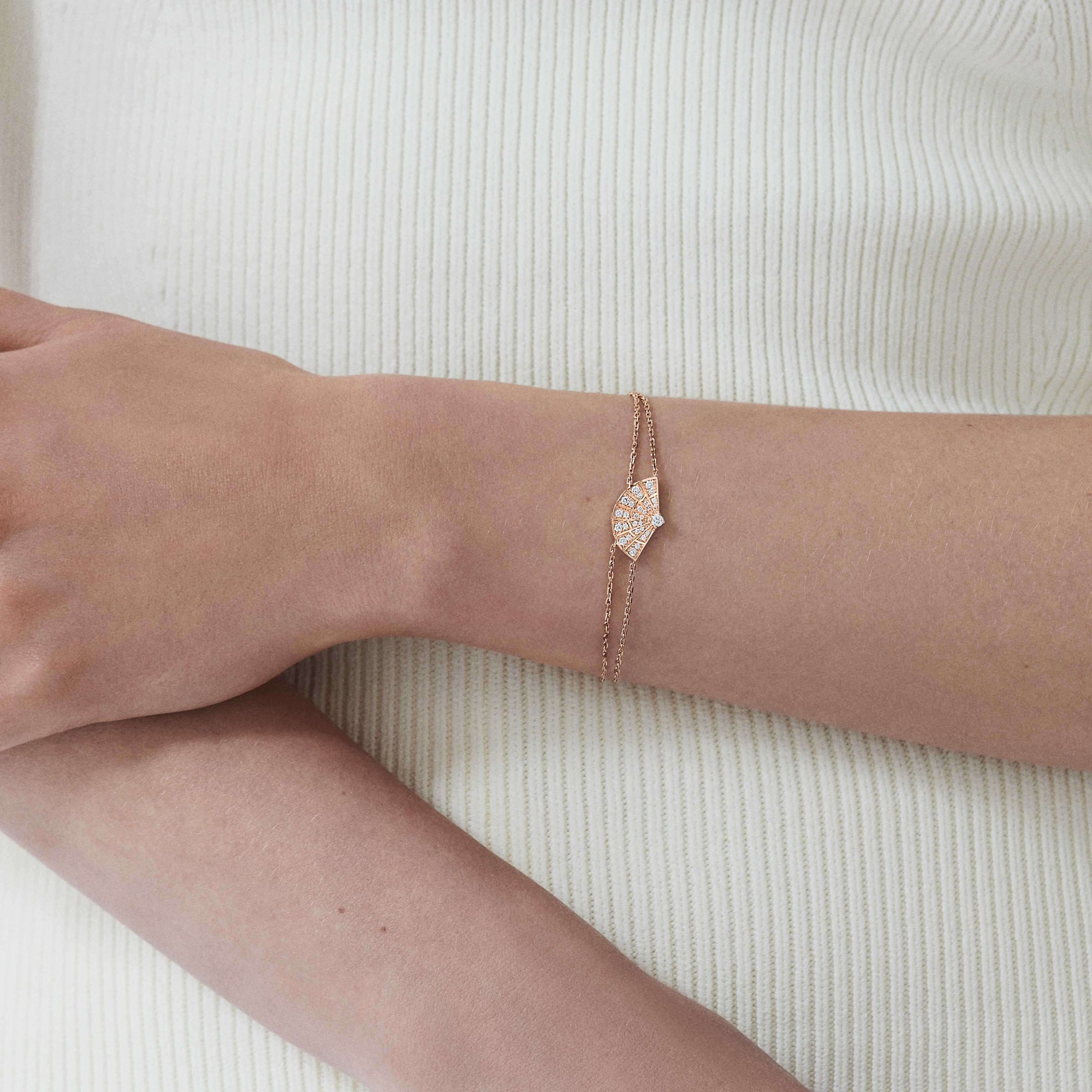 Garrard Mini Icons collection Fanfare Bracelet in 18ct Rose Gold with Diamonds 2018312 on model