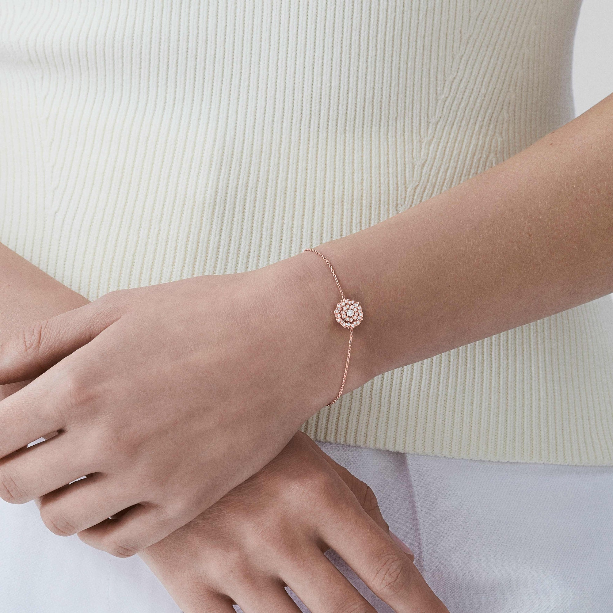 Garrard Mini Icons collection Tudor Rose Bracelet in 18ct Rose Gold with Diamonds 2012637 On Model