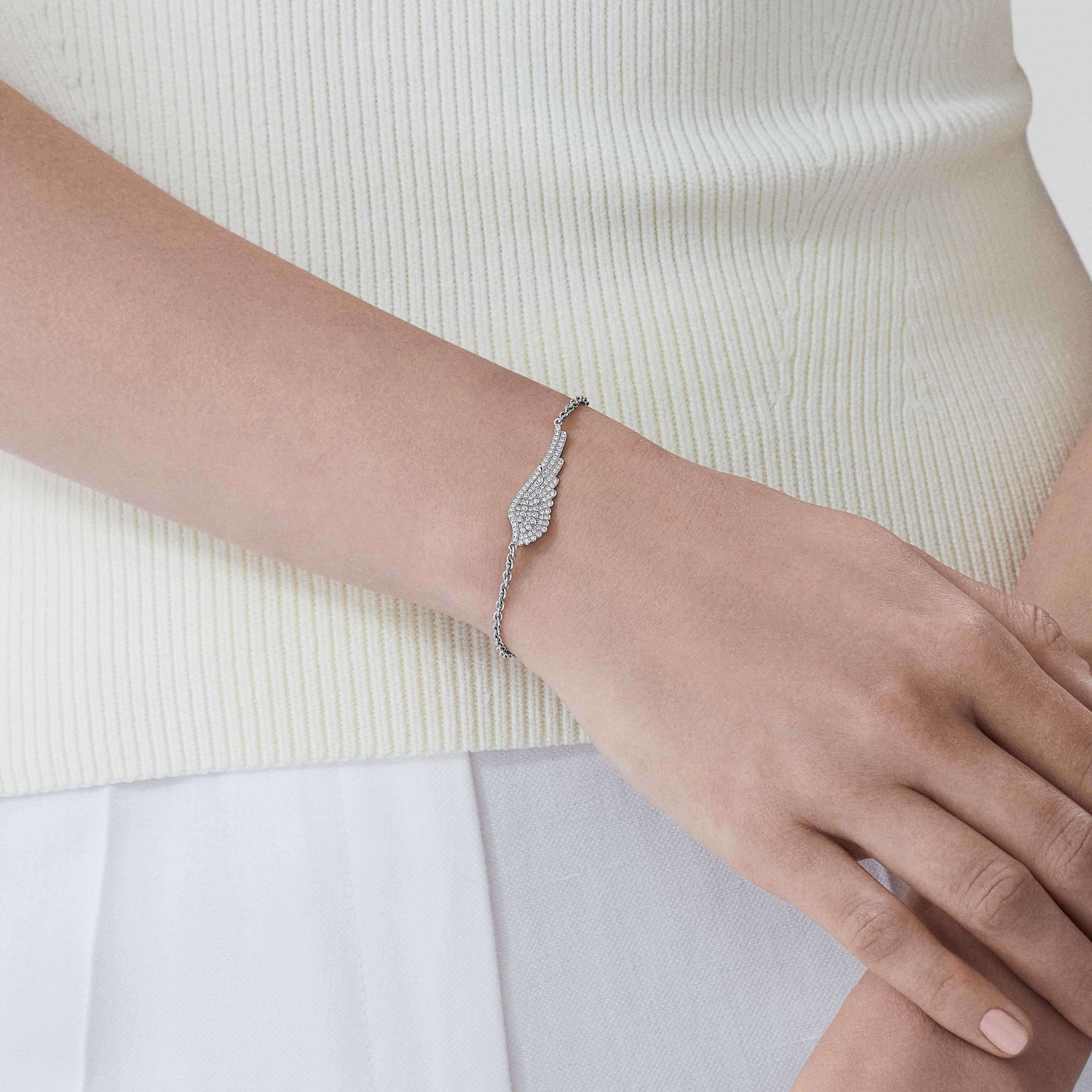 Garrard Mini Icons collection Wings Bracelet in 18ct White gold with Diamonds 2010981 on model