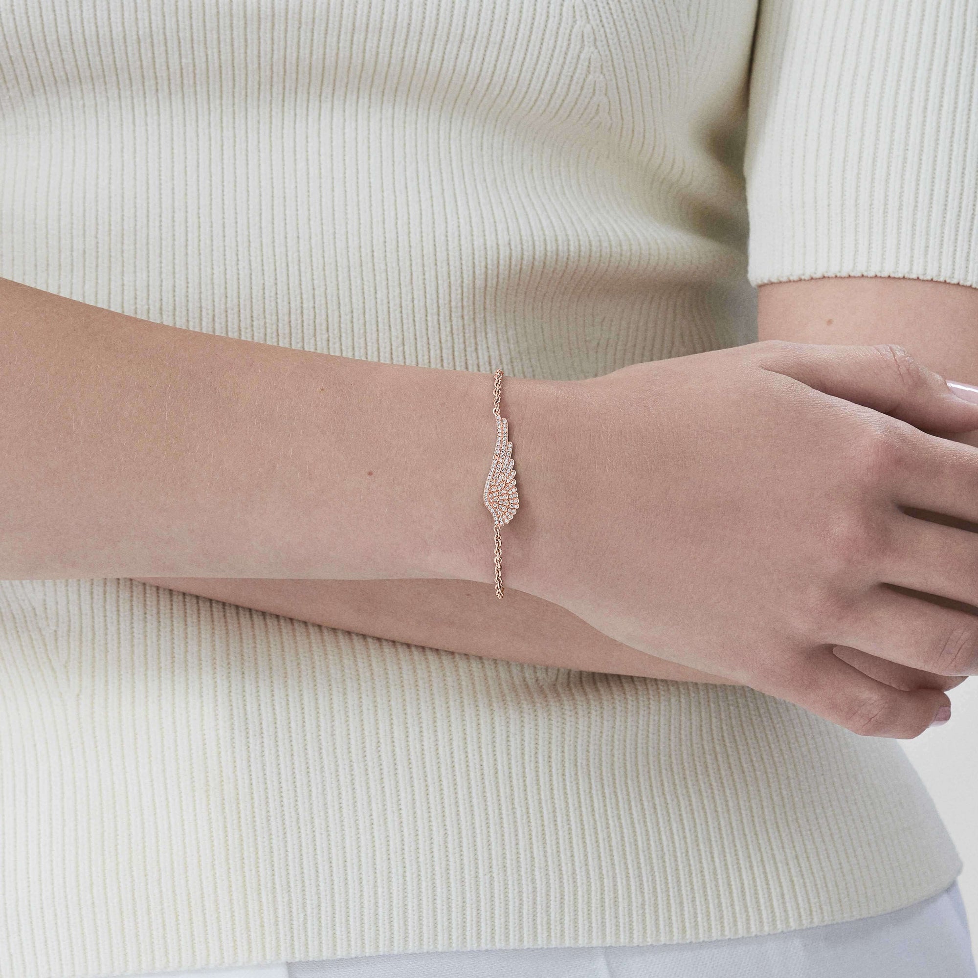 Garrard Mini Icons collection Wings Classic Bracelet in 18ct Rose Gold with Diamonds 2010981 on model