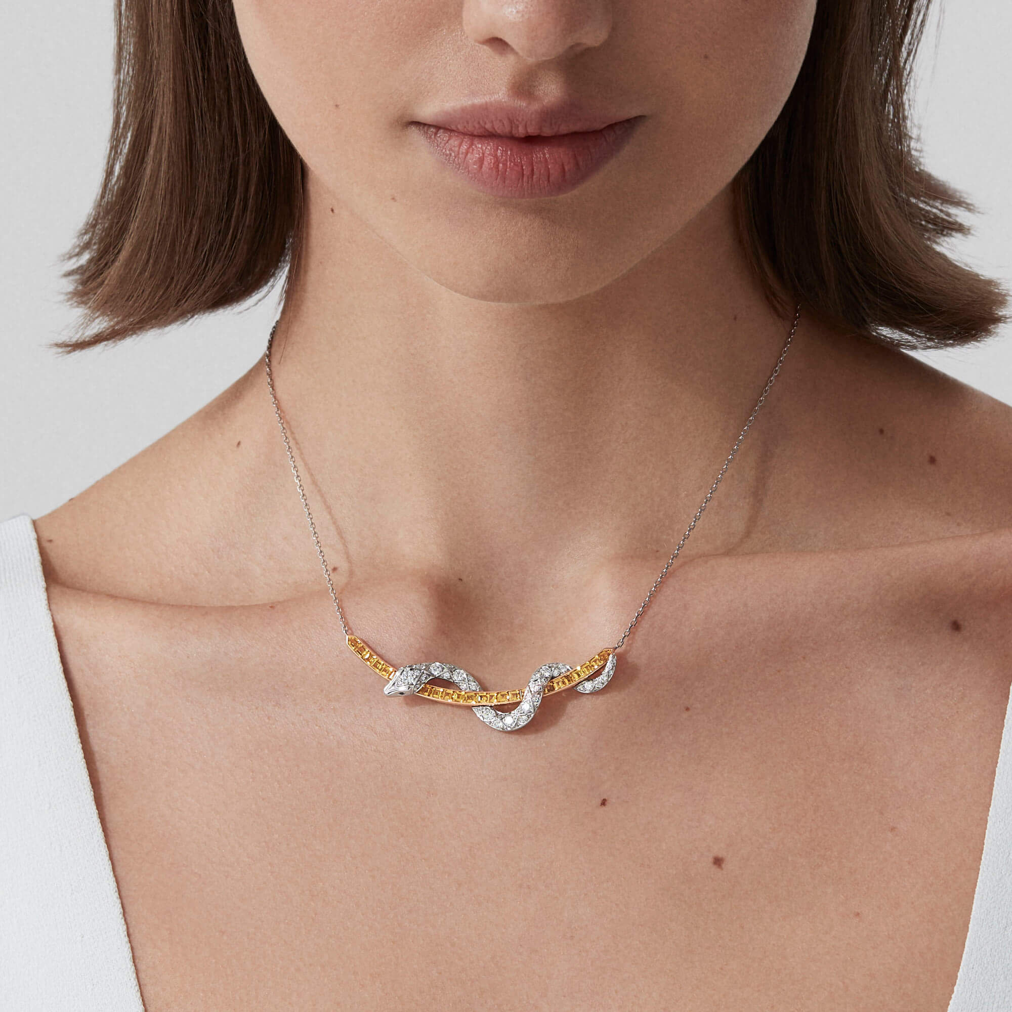 Garrard Muse Serpent Yellow Sapphire and Diamond Necklace In 18ct White Gold with Blue Sapphires 2016020 model