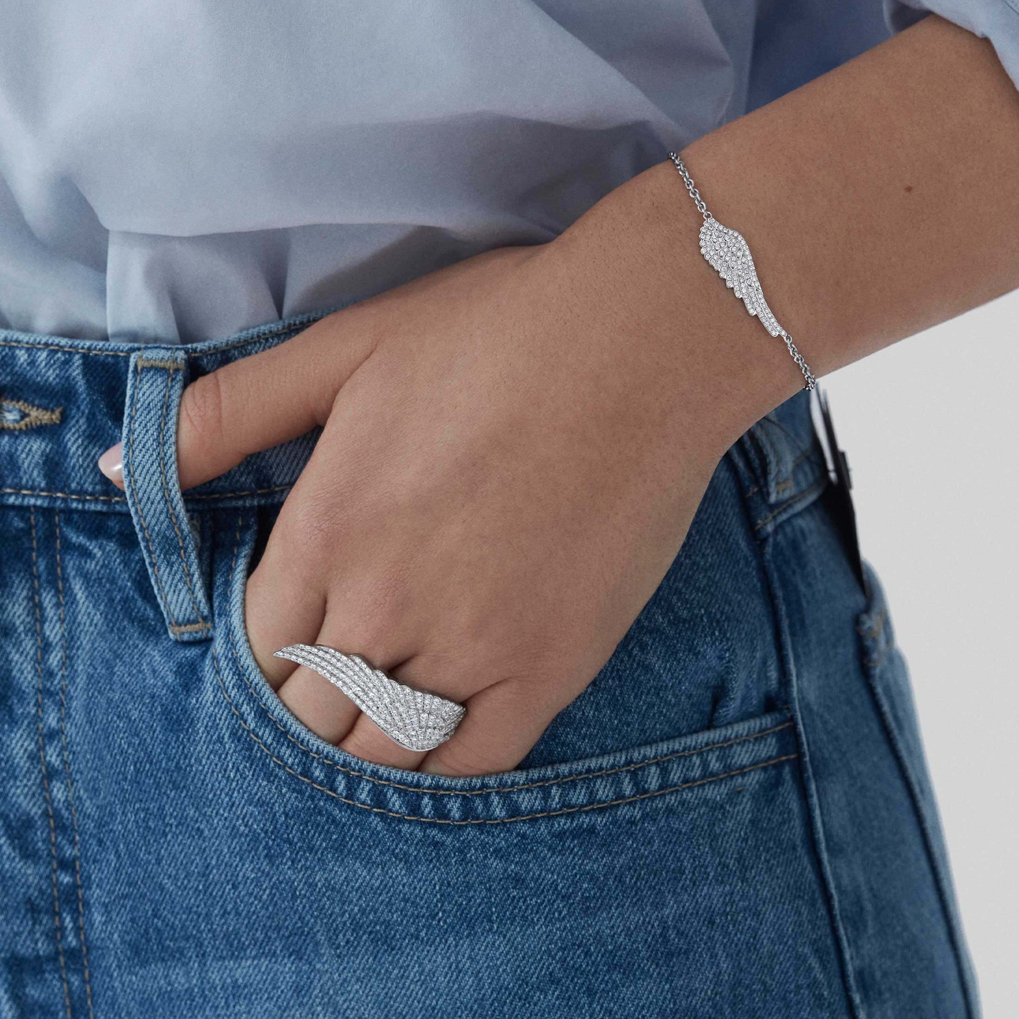 Garrard Wings Classic Ring in 18ct White gold with diamonds 2006816 and bracelet 2010981 Model