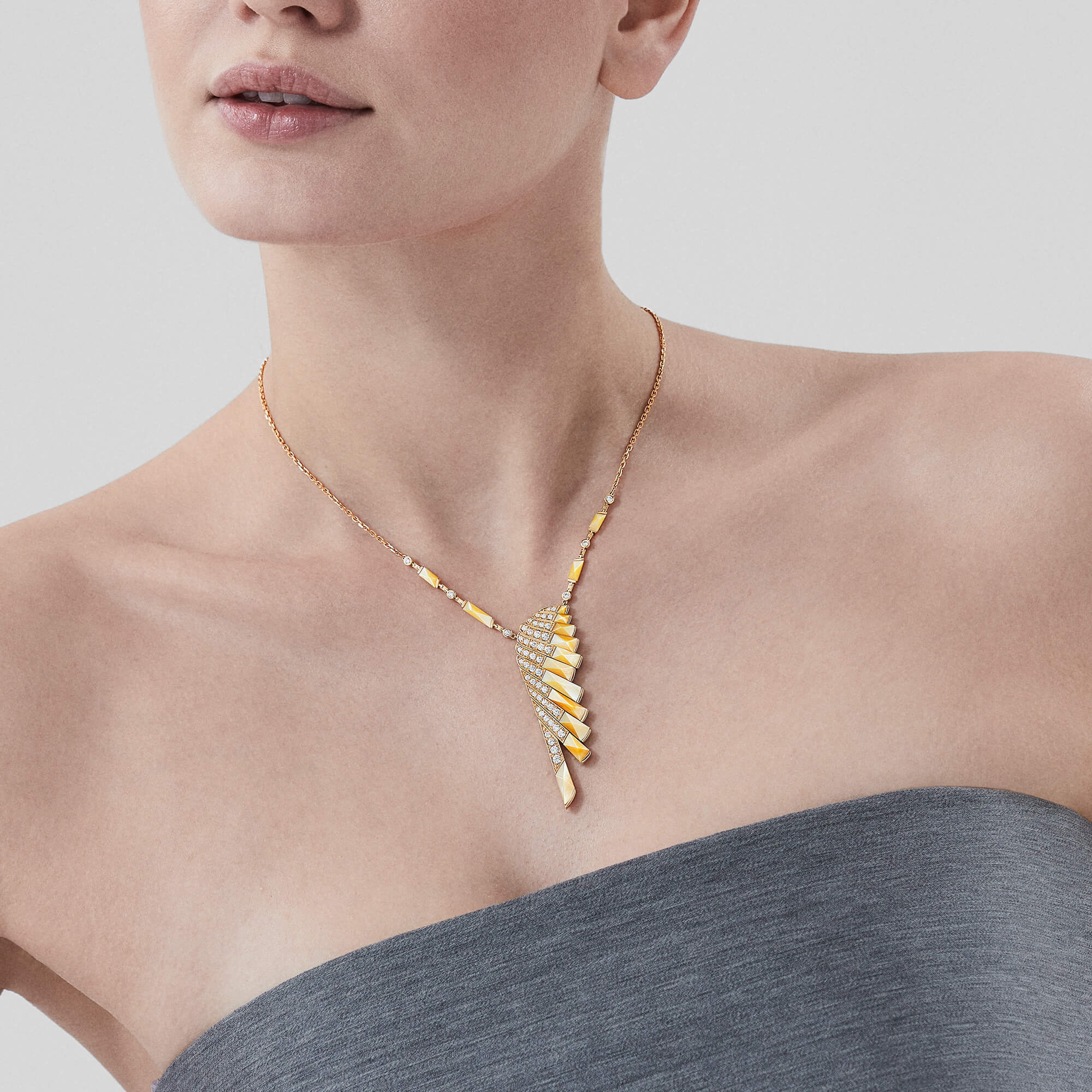 Garrard Wings Rising collection Diamond and Yellow Mother of Pearl Pendant in 18ct Yellow Gold 2018611 On model