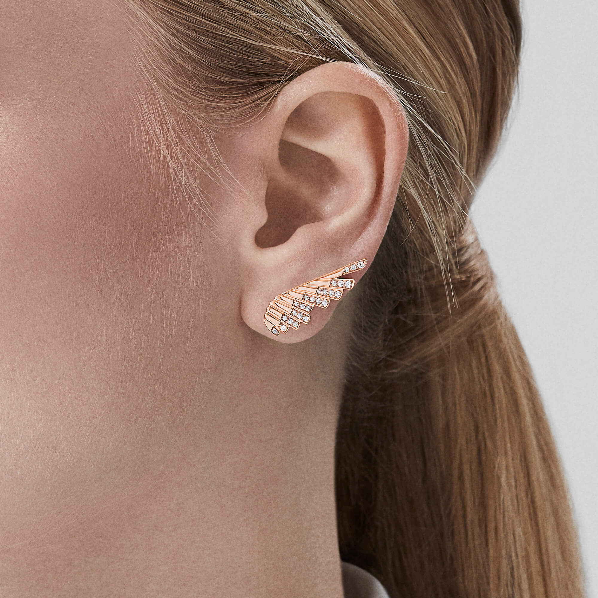 Garrard Wings Rising collection Mini Icon Diamond Earrings in 18ct Rose Gold 2018635 on model