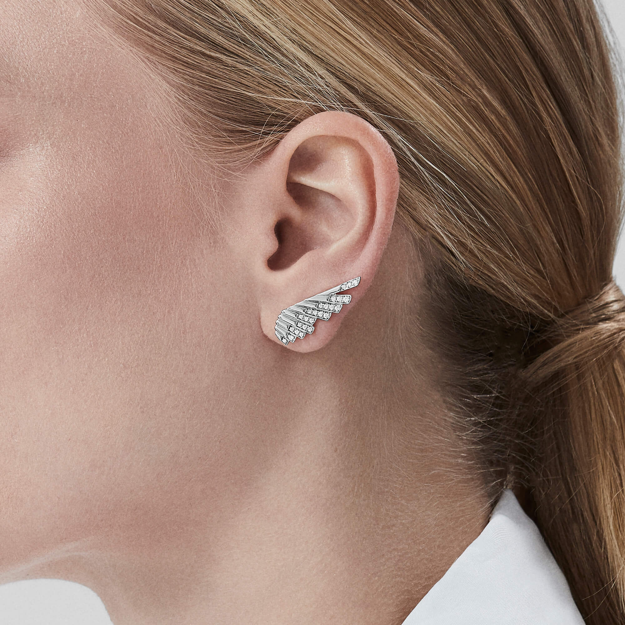 Garrard Wings Rising collection Mini Icon Diamond Earrings in 18ct White Gold 2018634 on model