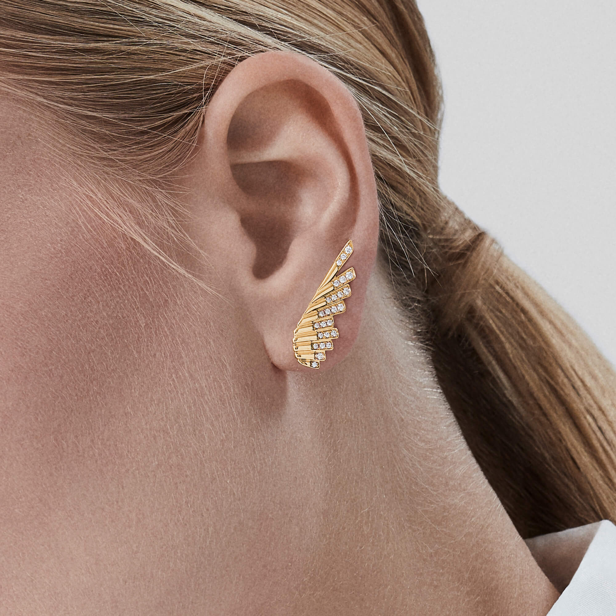 Garrard Wings Rising collection Mini Icon Diamond Earrings in 18ct Yellow Gold 2018636 on model